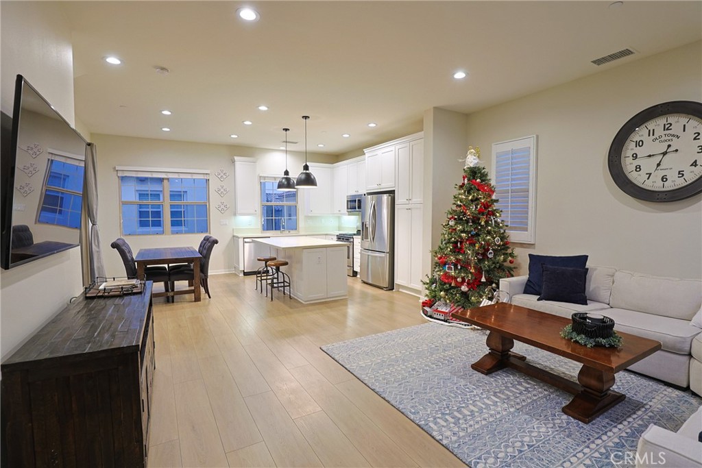 78 Kestrel Irvine, CA 92618 - Photo 3 of 32 a living room with furniture and wooden floor
