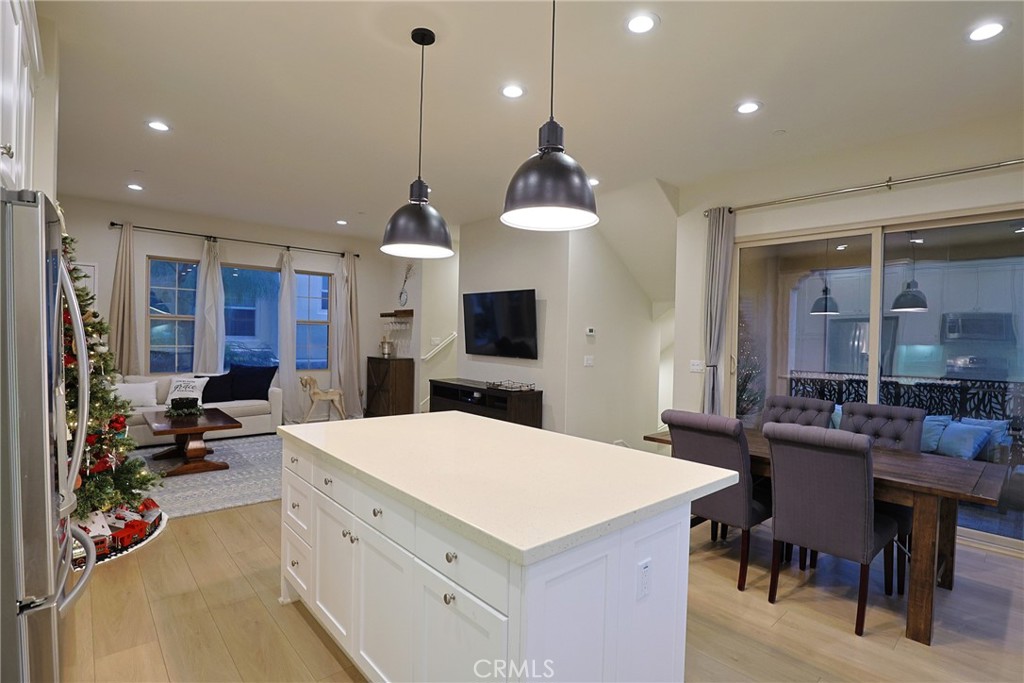 78 Kestrel Irvine, CA 92618 - Photo 8 of 32 a large kitchen with a table and chairs