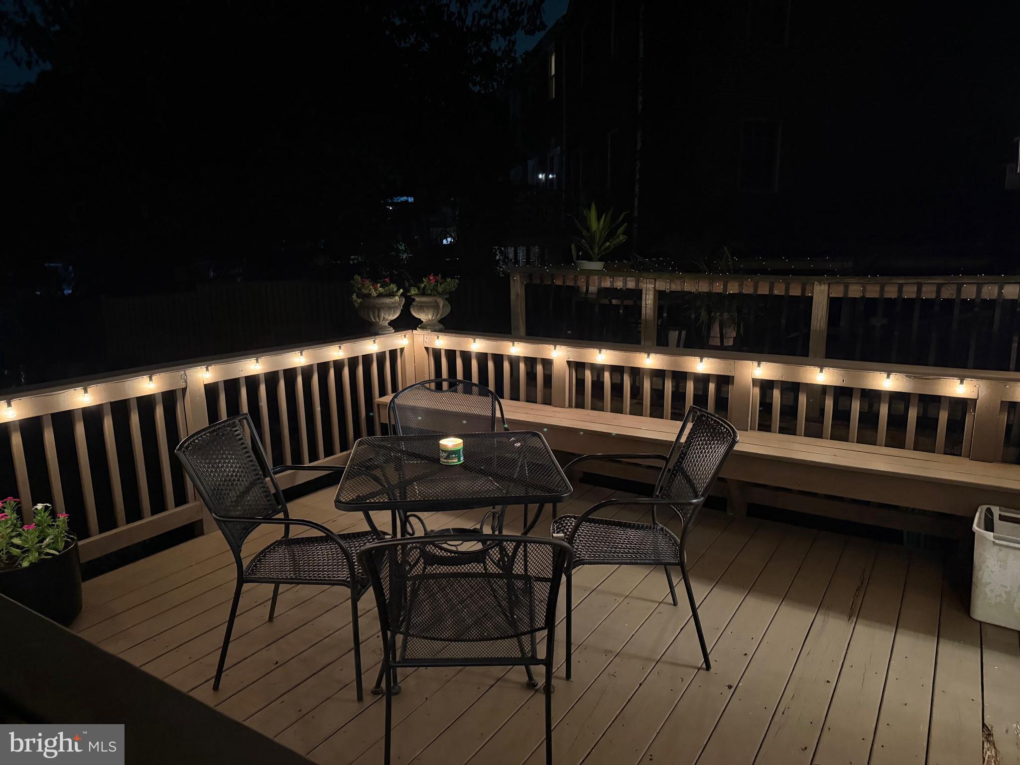 112 Regester Avenue Baltimore, MD 21212 - Photo 17 of 36 a view of a chairs and table on the terrace