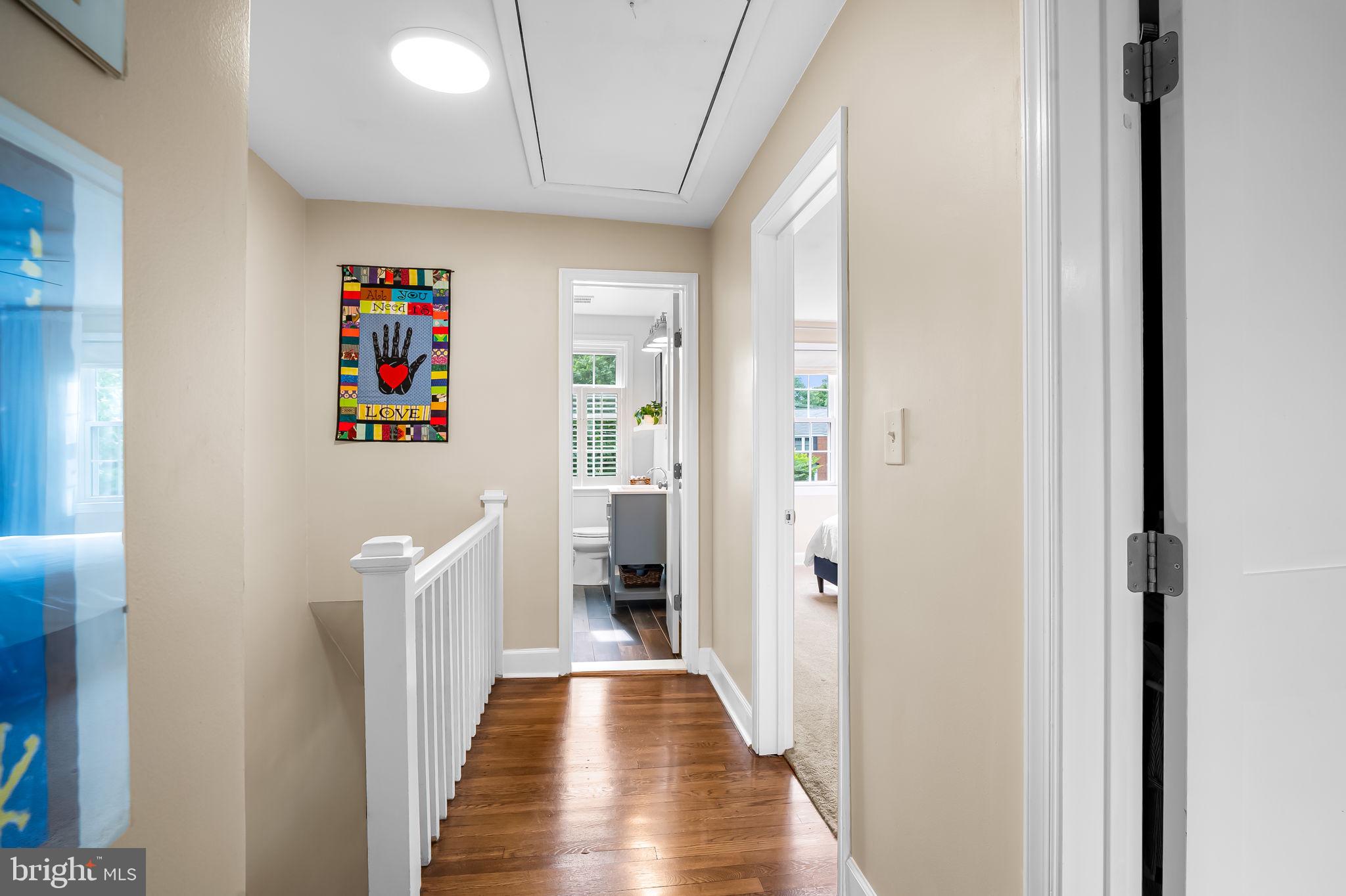 112 Regester Avenue Baltimore, MD 21212 - Photo 23 of 36 a view of a hallway with wooden floor