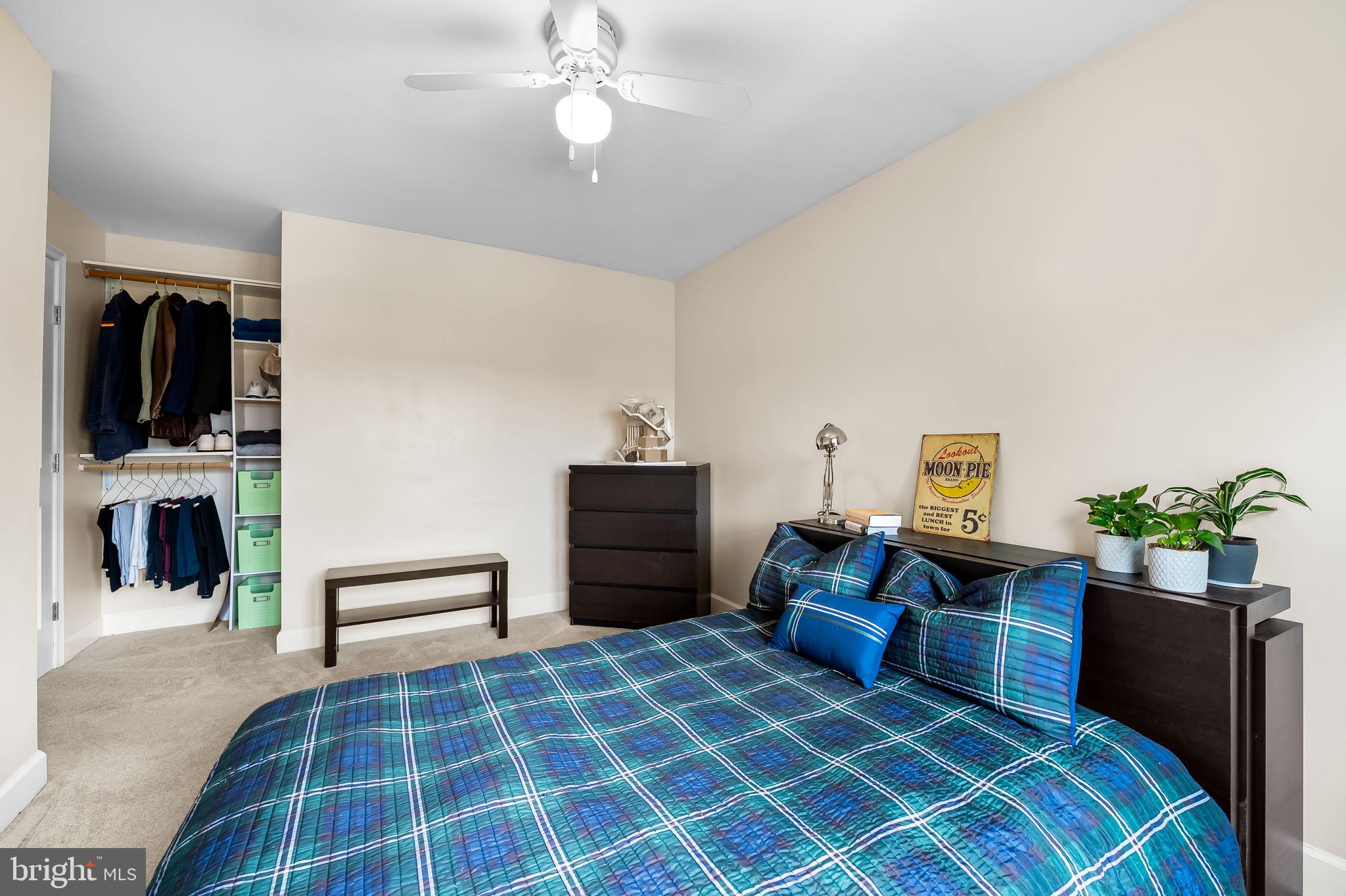 112 Regester Avenue Baltimore, MD 21212 - Photo 26 of 36 a bedroom with furniture and a flat screen tv