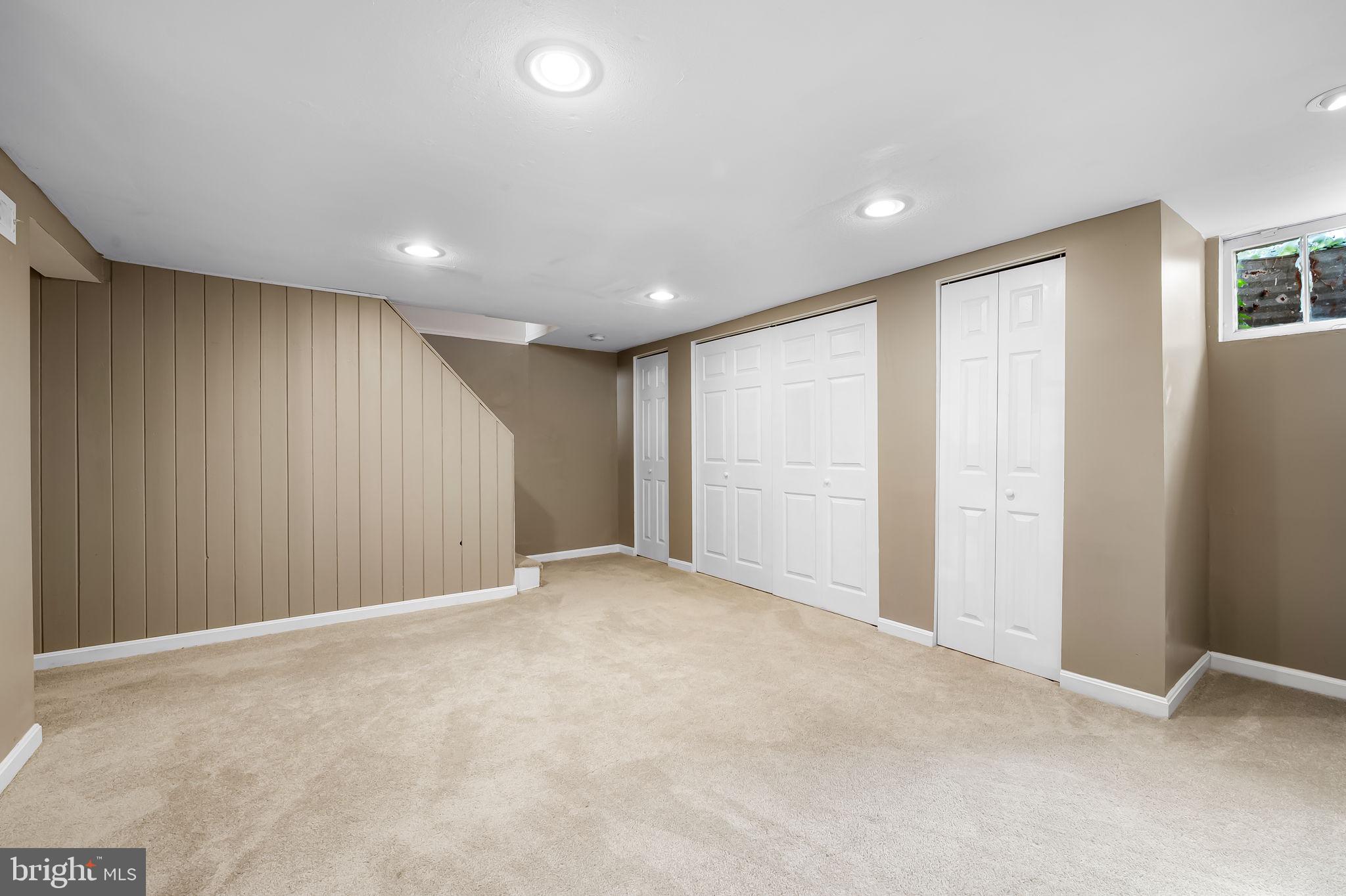 112 Regester Avenue Baltimore, MD 21212 - Photo 30 of 36 a view of an empty room with windows