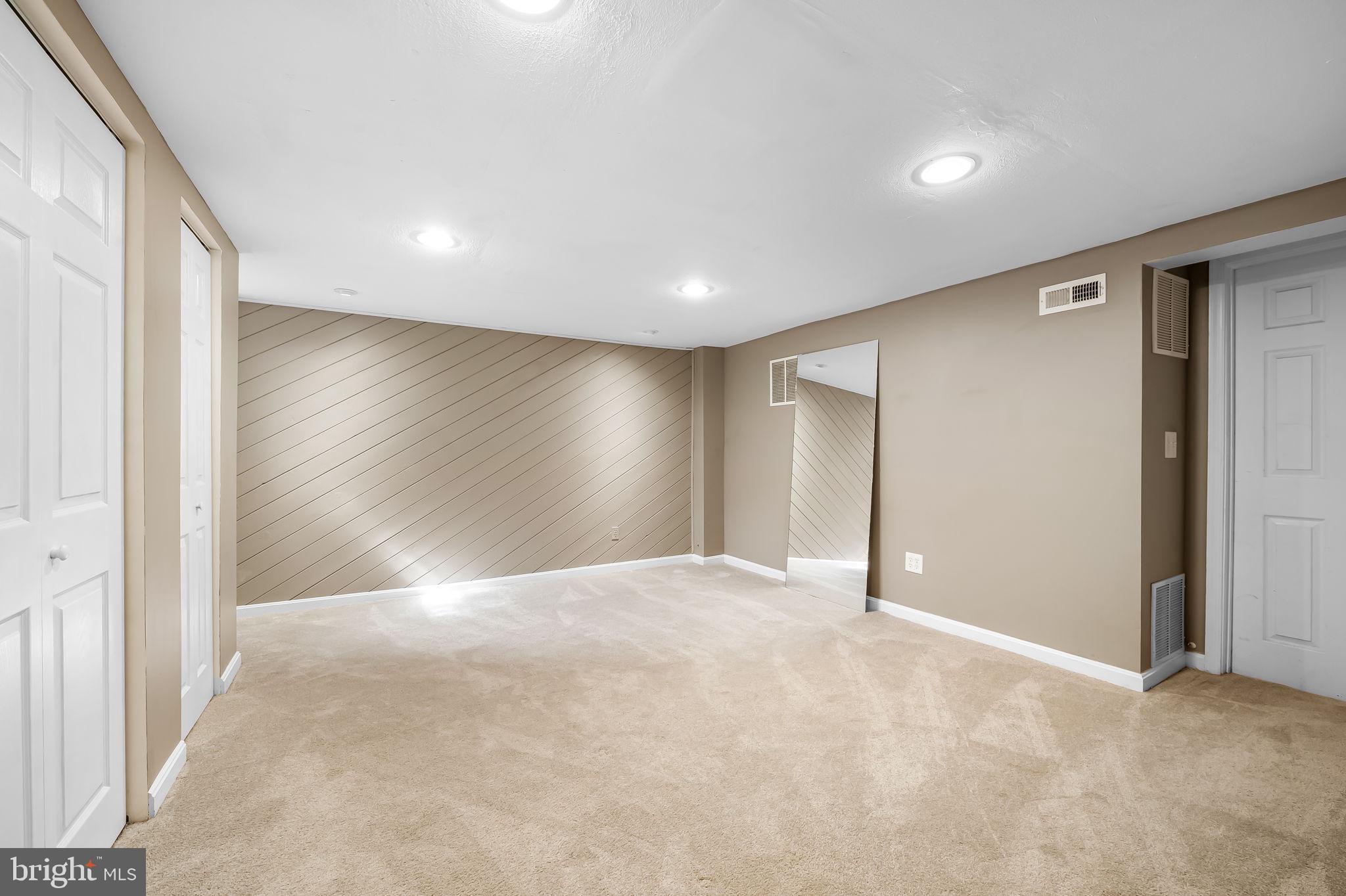 112 Regester Avenue Baltimore, MD 21212 - Photo 31 of 36 a view of an empty room