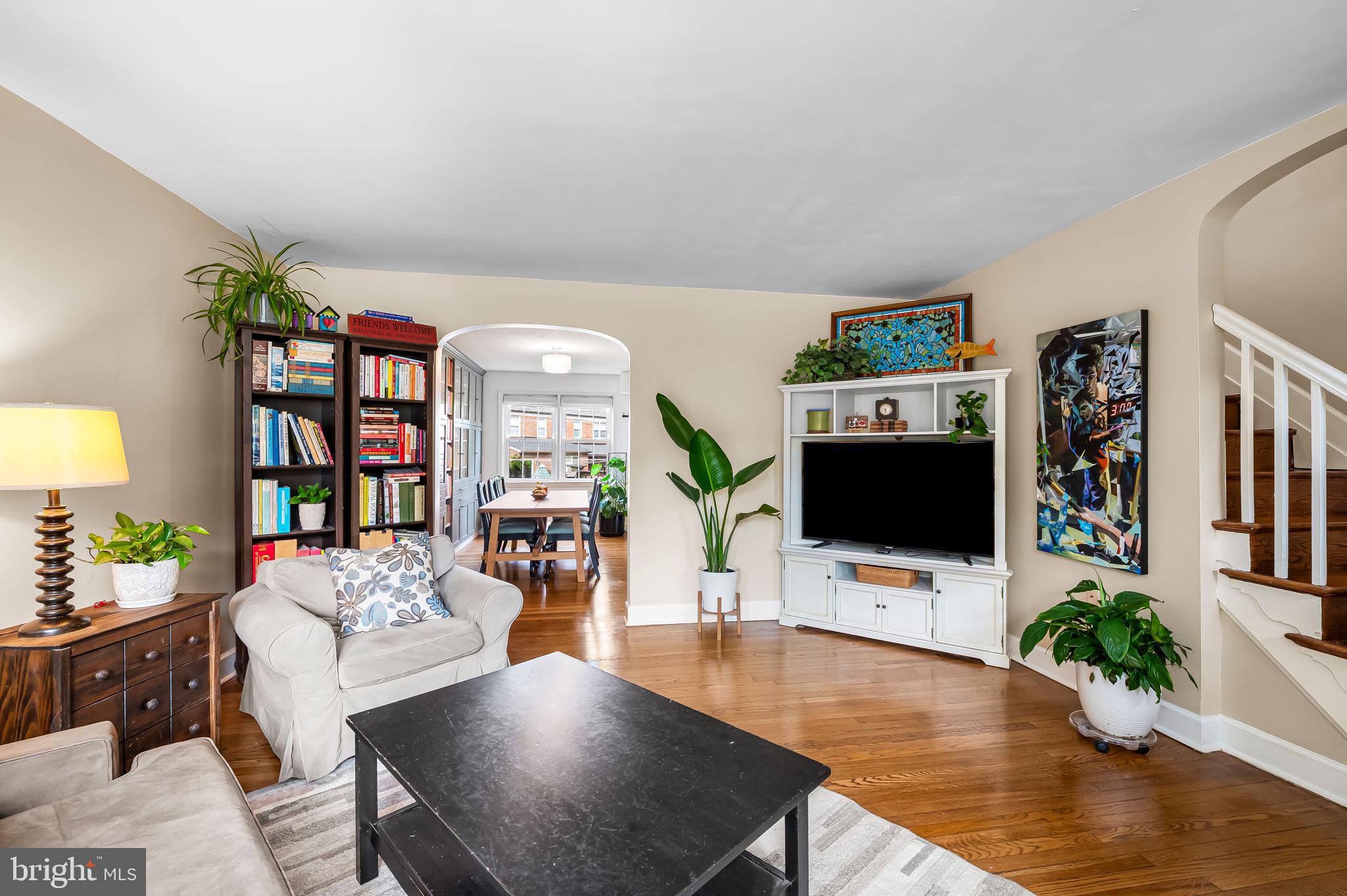 112 Regester Avenue Baltimore, MD 21212 - Photo 5 of 36 a living room with furniture and a flat screen tv