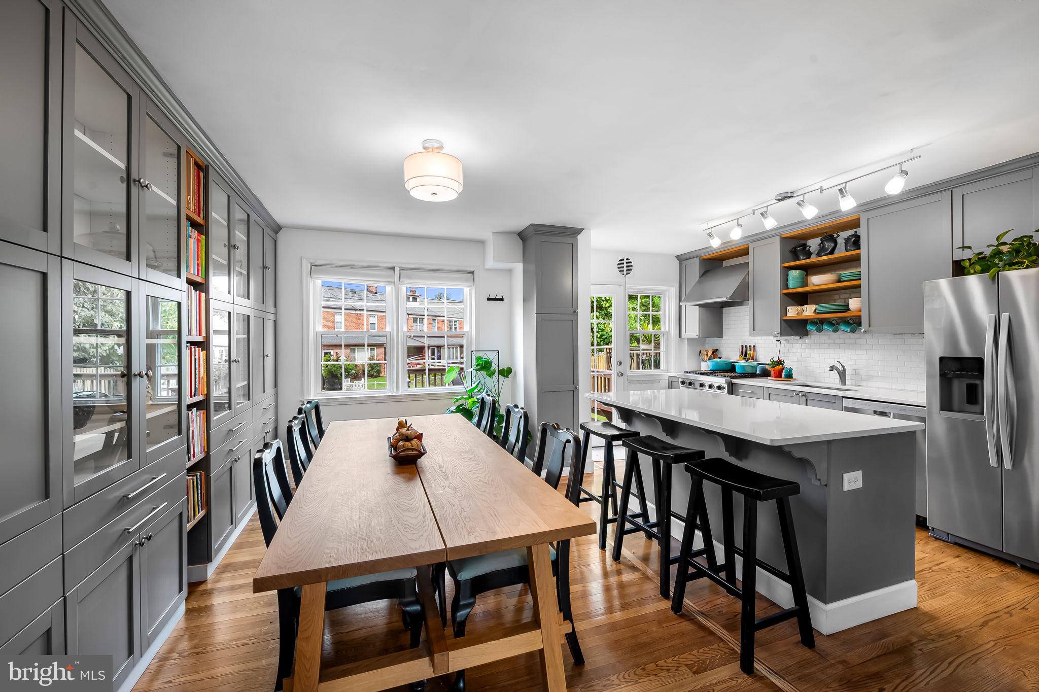 112 Regester Avenue Baltimore, MD 21212 - Photo 9 of 36 a view of a dining room with furniture window and wooden floor