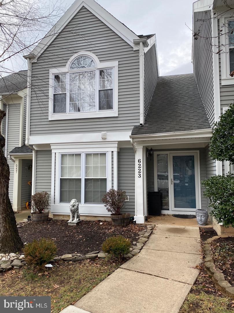 6223 Stonepath Circle Centreville, VA 20120 - Photo 1 of 1 a front view of a house with garden