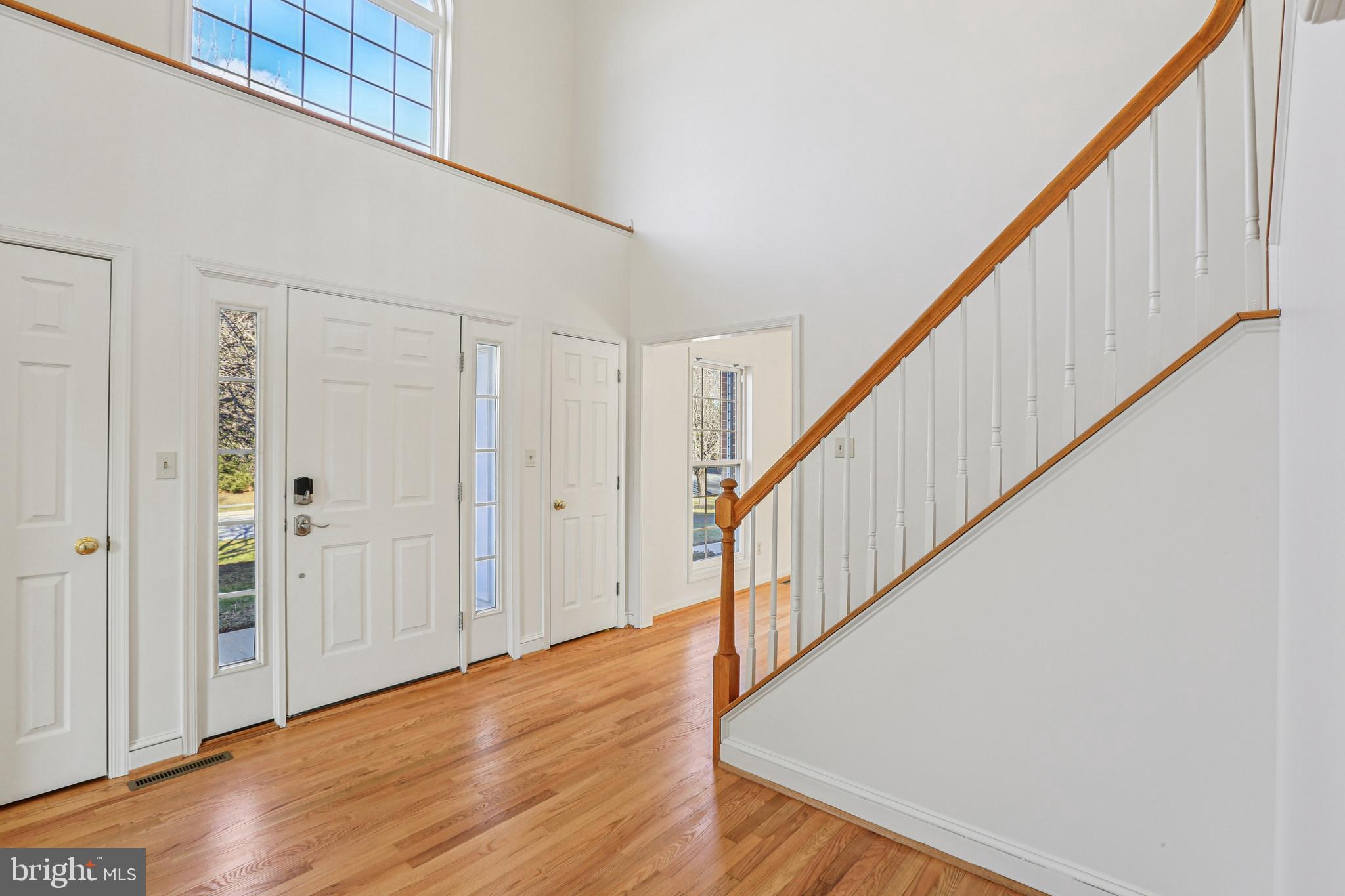 3924 Paul Mill Road Ellicott City, MD 21042 - Photo 2 of 51 a view of staircase with wooden floor and staircase