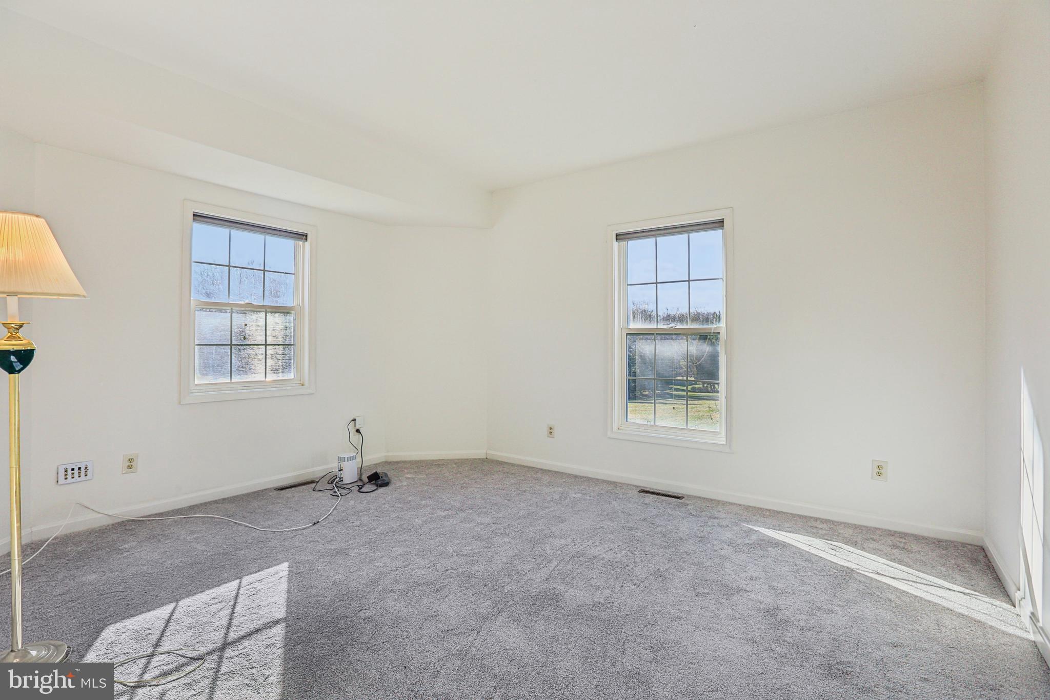 3924 Paul Mill Road Ellicott City, MD 21042 - Photo 27 of 51 an empty room with windows