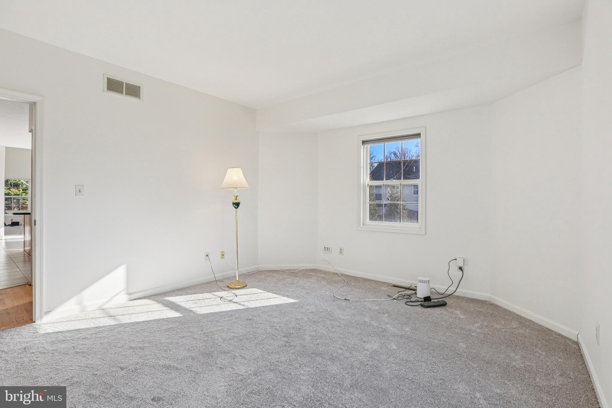3924 Paul Mill Road Ellicott City, MD 21042 - Photo 28 of 51 a view of a room with rack on the wall and a window