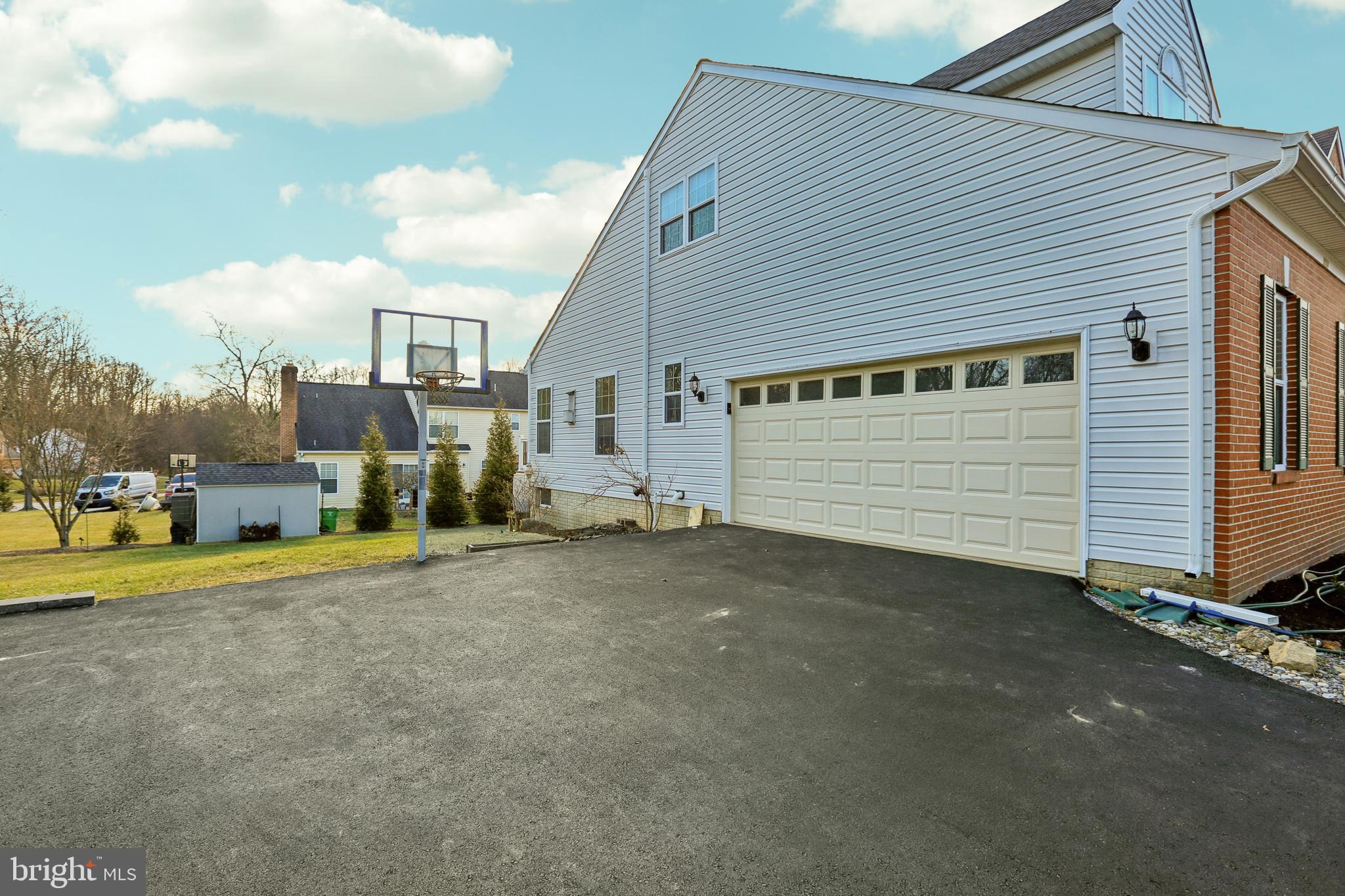 3924 Paul Mill Road Ellicott City, MD 21042 - Photo 46 of 51 a view of a house with backyard