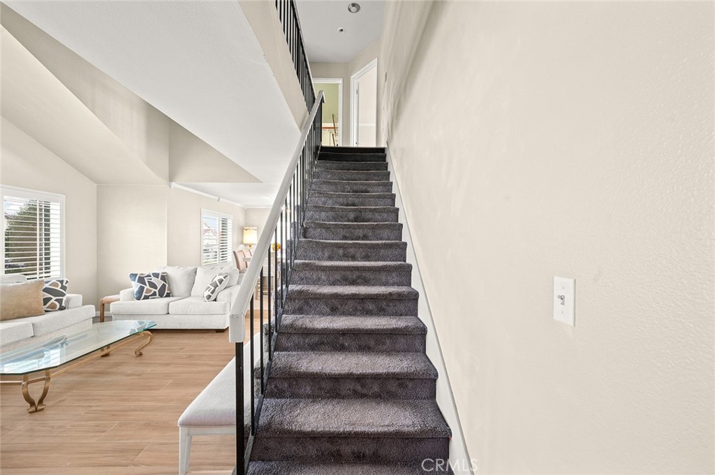 1790 North Encina Avenue Rialto, CA 92376 - Photo 19 of 47 a view of entryway and hall with wooden floor
