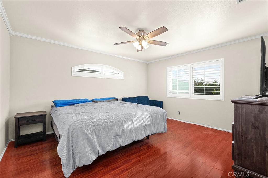 1790 North Encina Avenue Rialto, CA 92376 - Photo 21 of 47 a bedroom with a bed and a window