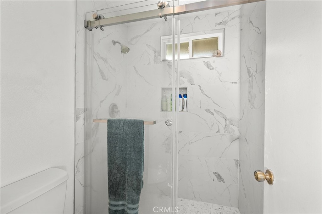 1790 North Encina Avenue Rialto, CA 92376 - Photo 27 of 47 a bathroom with a shower