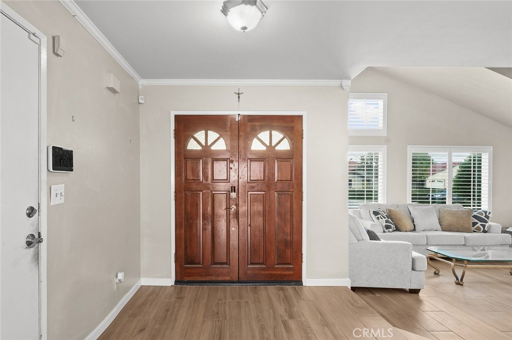 1790 North Encina Avenue Rialto, CA 92376 - Photo 3 of 47 a living room with furniture and wooden floor