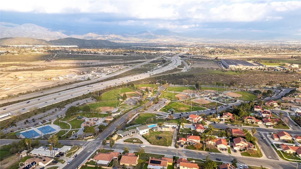 1790 North Encina Avenue Rialto, CA 92376 - Photo 44 of 47 an aerial view of residential building and lake view