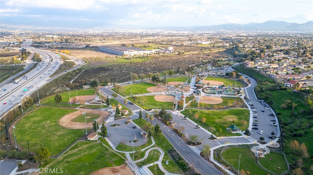 1790 North Encina Avenue Rialto, CA 92376 - Photo 46 of 47 an aerial view of a house with yard swimming pool and outdoor seating