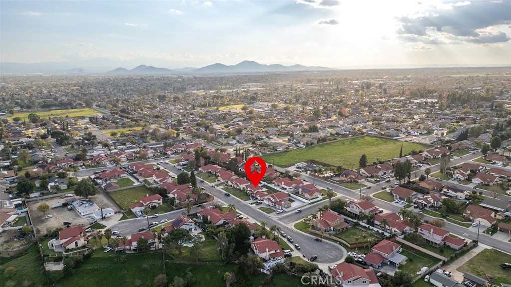 1790 North Encina Avenue Rialto, CA 92376 - Photo 47 of 47 an aerial view of residential houses with outdoor space and trees