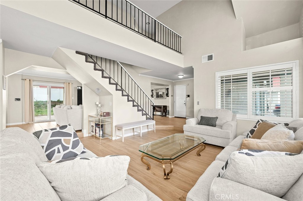 1790 North Encina Avenue Rialto, CA 92376 - Photo 6 of 47 a living room with furniture and a table