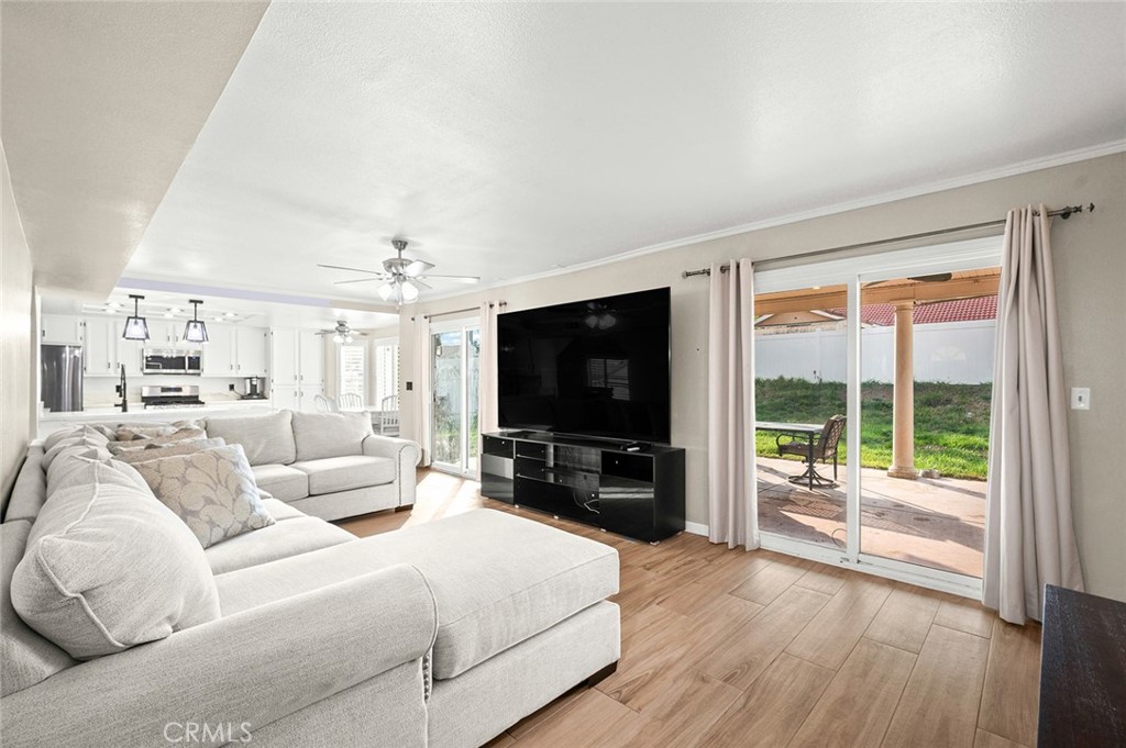1790 North Encina Avenue Rialto, CA 92376 - Photo 9 of 47 a living room with furniture and a flat screen tv