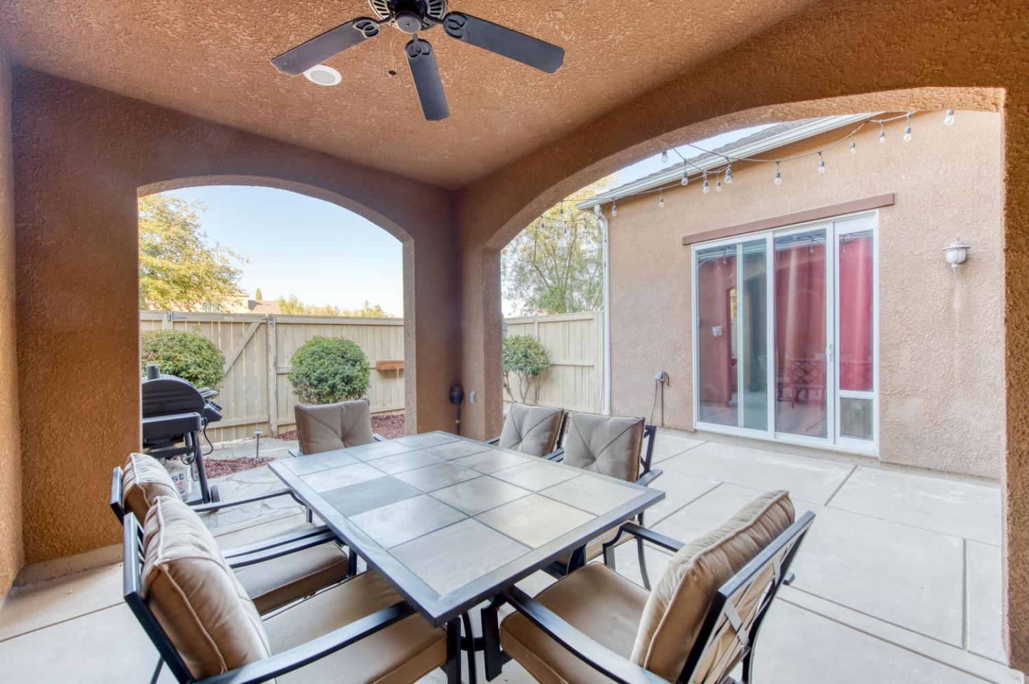 4085 Harlan Ranch Boulevard Clovis, CA 93619 - Photo 24 of 27 a view of a dining room with furniture window and outside view