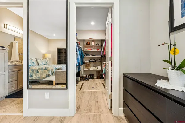 a en suite bathroom with a sink and mirror