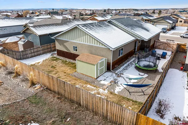 a view of a patio with furniture