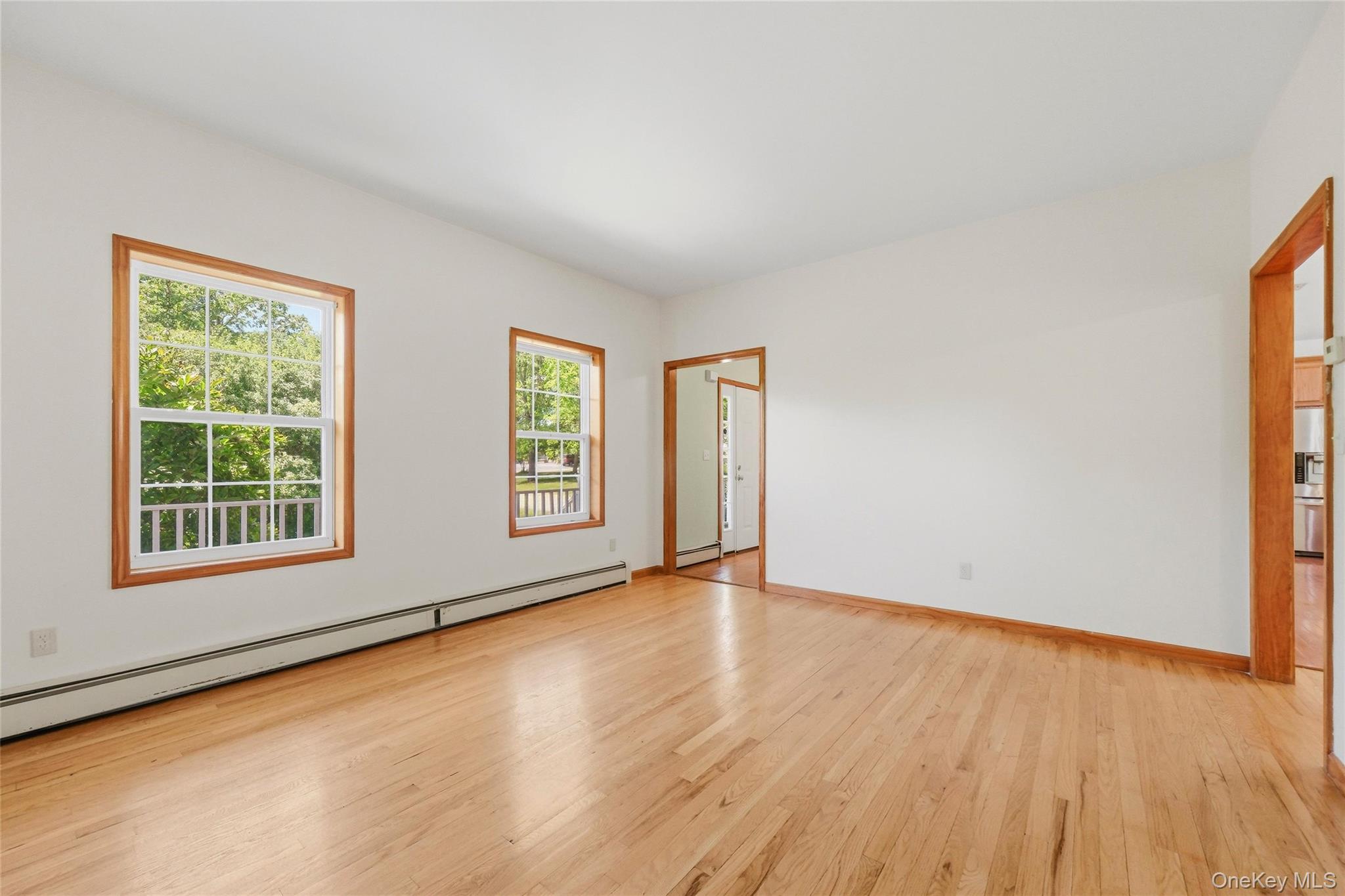 5 Horton Road Washingtonville, NY 10992 - Photo 14 of 42 an empty room with wooden floor and windows