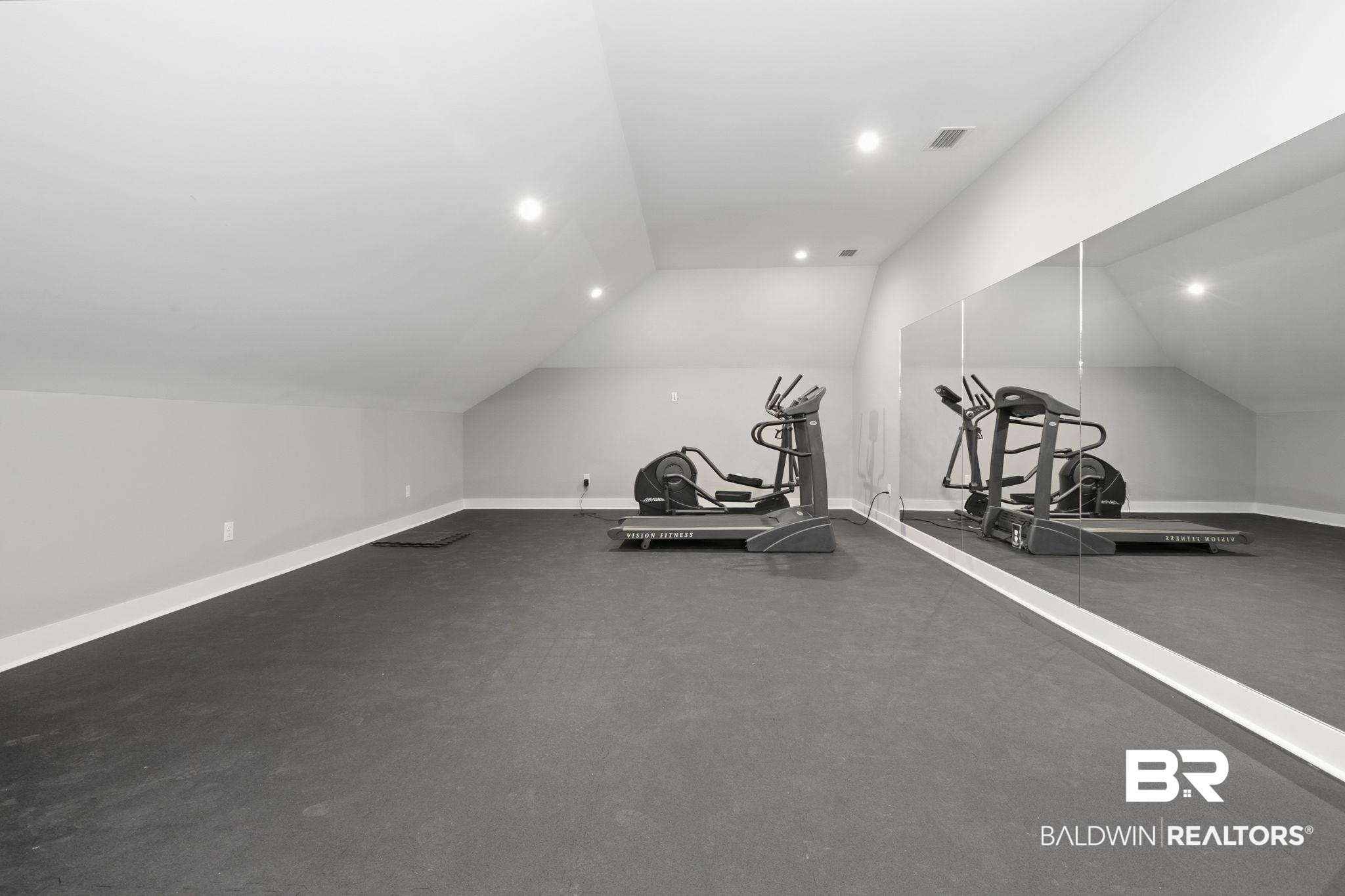 9501 Ben Hamilton Road Theodore, AL 36582 - Photo 54 of 69 Exercise area with baseboards and vaulted ceiling