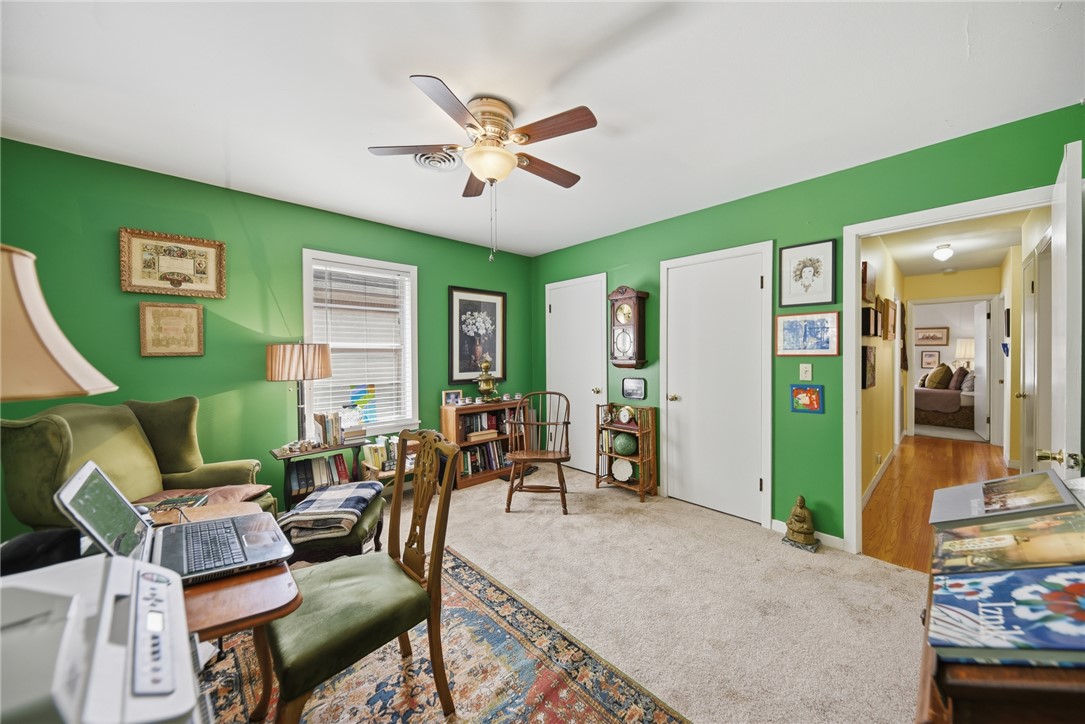 1703 South Day Street Brenham, TX 77833 - Photo 12 of 41 a living room with furniture and a large window