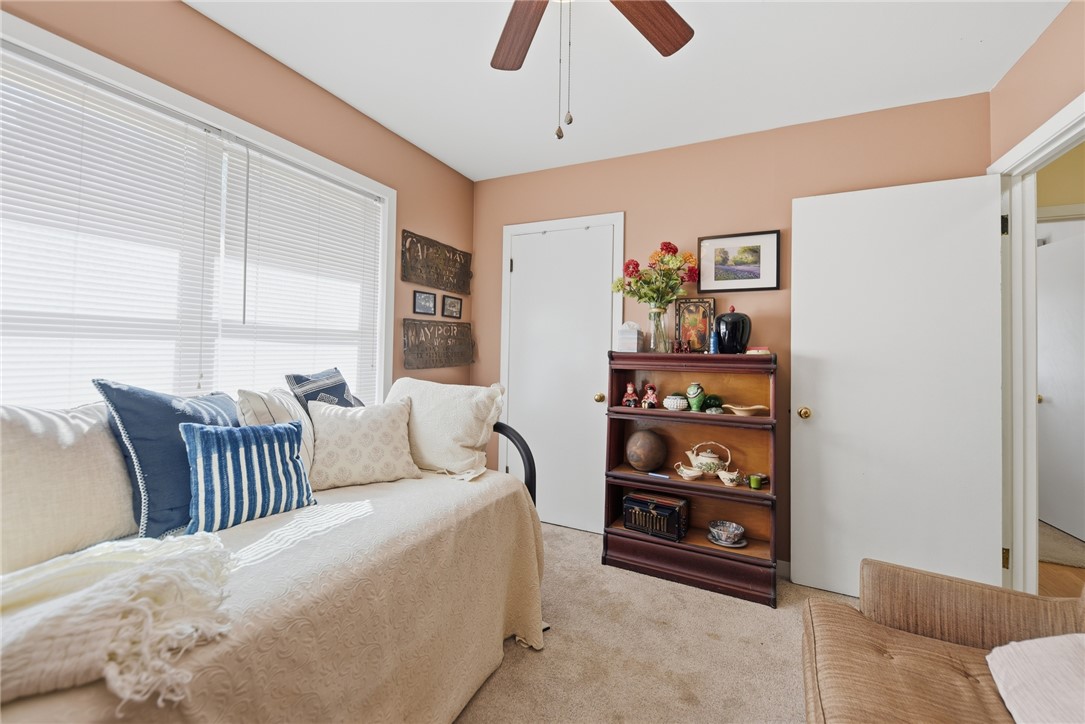 1703 South Day Street Brenham, TX 77833 - Photo 20 of 41 a bedroom with furniture and a window