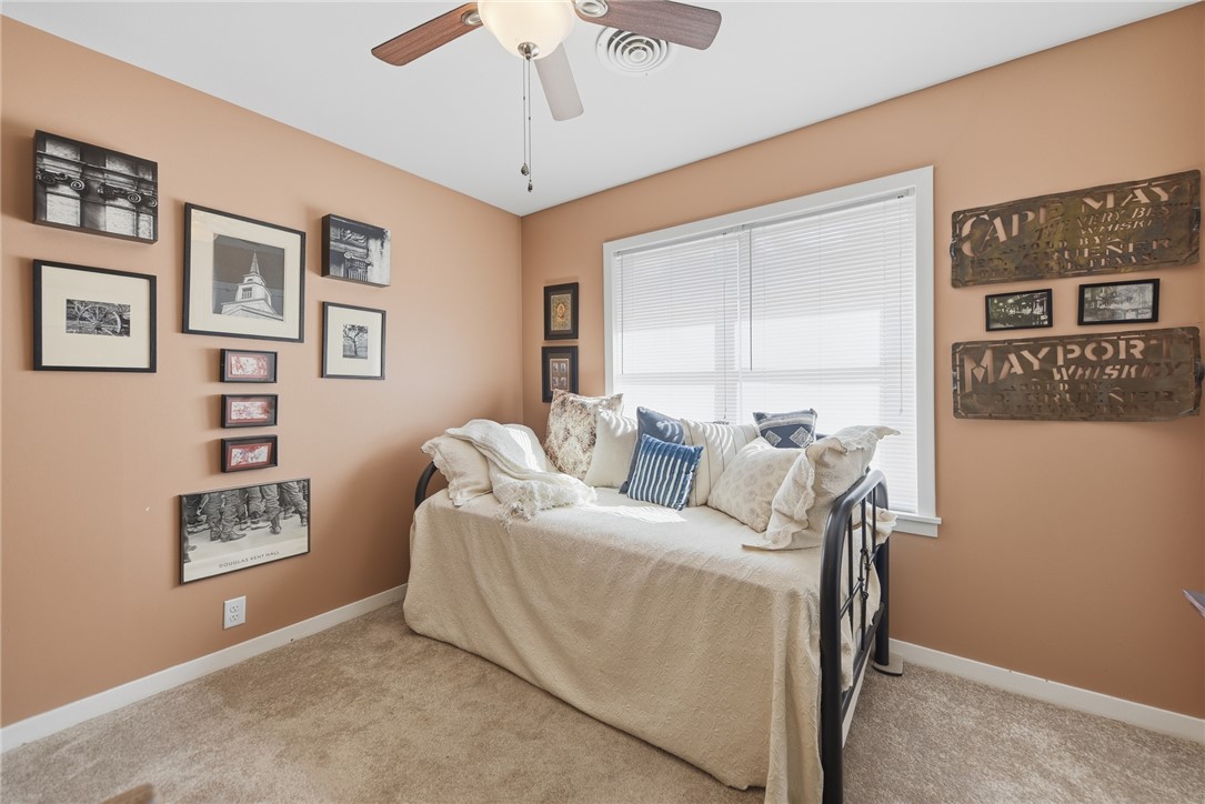 1703 South Day Street Brenham, TX 77833 - Photo 21 of 41 a living room with furniture and a window