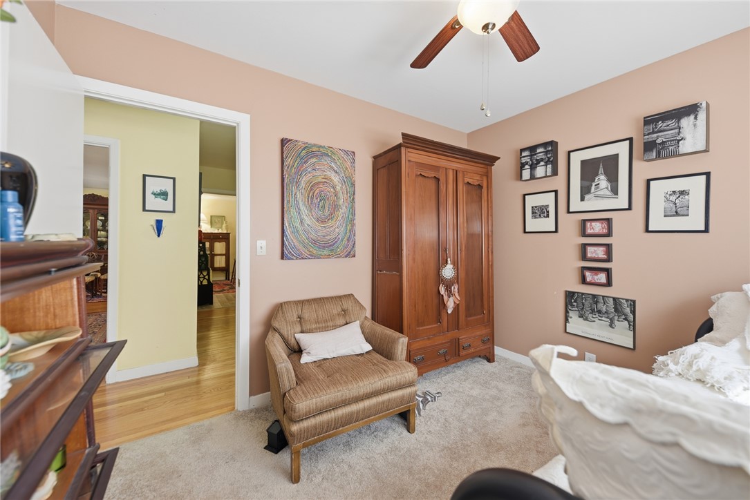 1703 South Day Street Brenham, TX 77833 - Photo 22 of 41 a bedroom with furniture and a large window