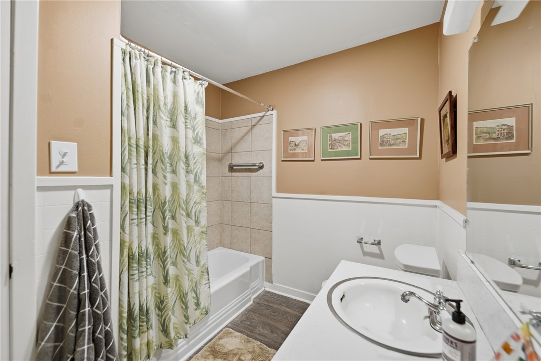 1703 South Day Street Brenham, TX 77833 - Photo 23 of 41 a bathroom with a sink toilet and shower