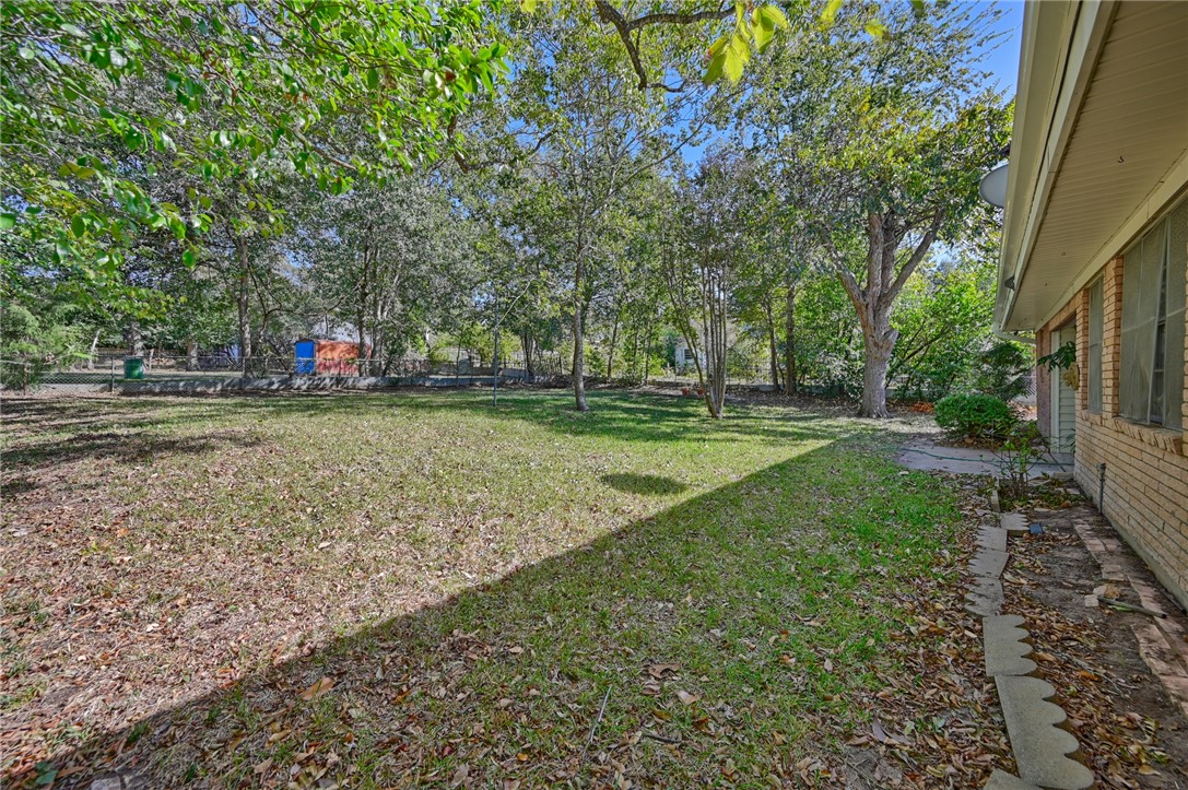 1703 South Day Street Brenham, TX 77833 - Photo 35 of 41 a view of a field with large trees