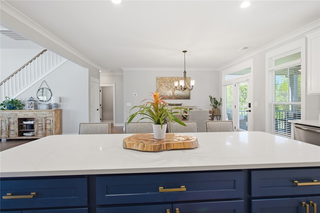 318 Summerall Drive Anderson, SC 29621 - Photo 10 of 41 This bright kitchen with a large island creates a welcoming atmosphere perfect for daily living and entertaining.
