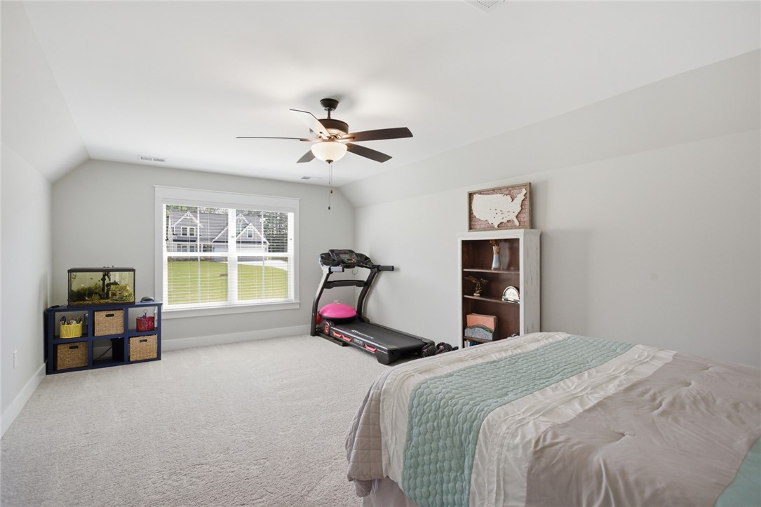 318 Summerall Drive Anderson, SC 29621 - Photo 25 of 41 This spacious bedroom offers ample natural light and a comfortable, serene atmosphere.