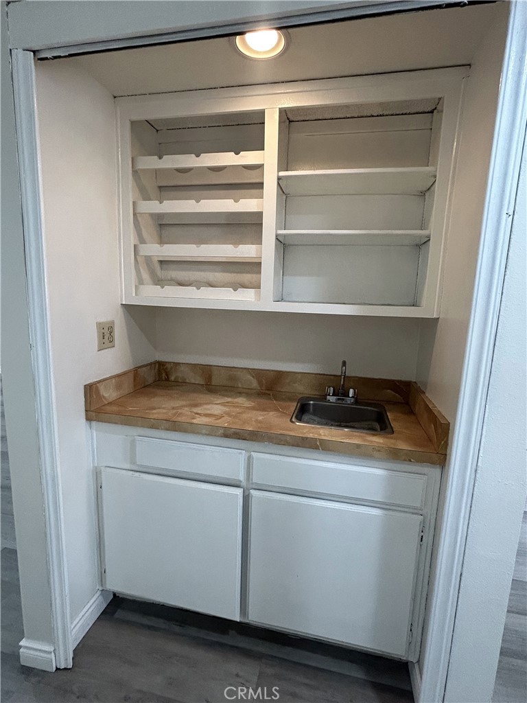 400 South Garfield Avenue, Unit 5 Alhambra, CA 91801 - Photo 7 of 23 a storage room with washer and dryer