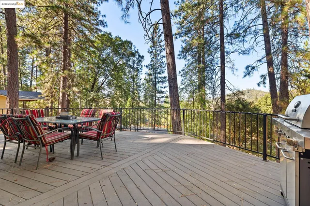 a view of a chairs and table on the wooden floor