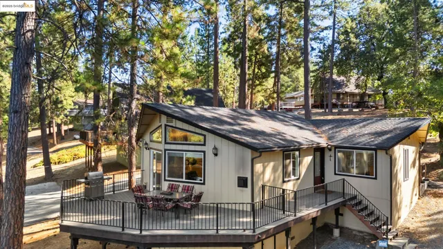 a view of house with a outdoor seating