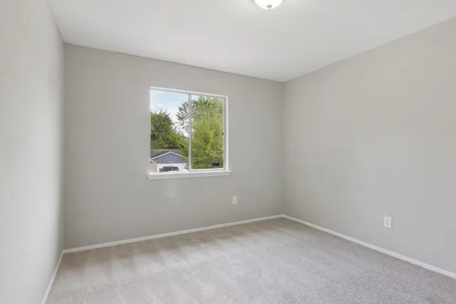 an empty room with a window