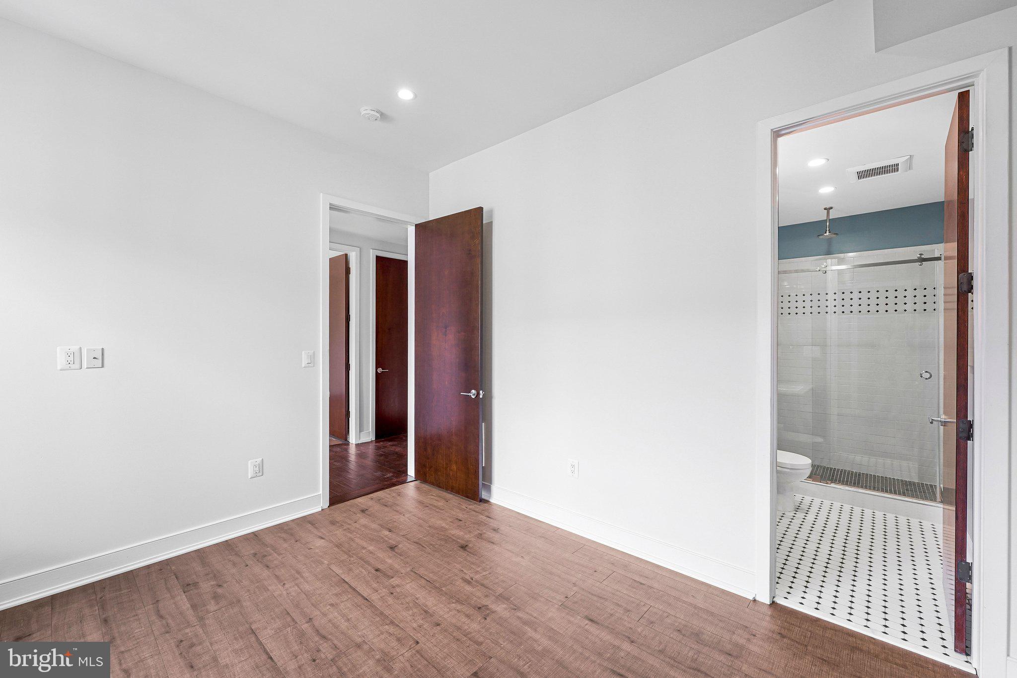 1931 12th Street Northwest, Unit A Washington, DC 20009 - Photo 16 of 47 Main level bedroom 2
with inside bathroom