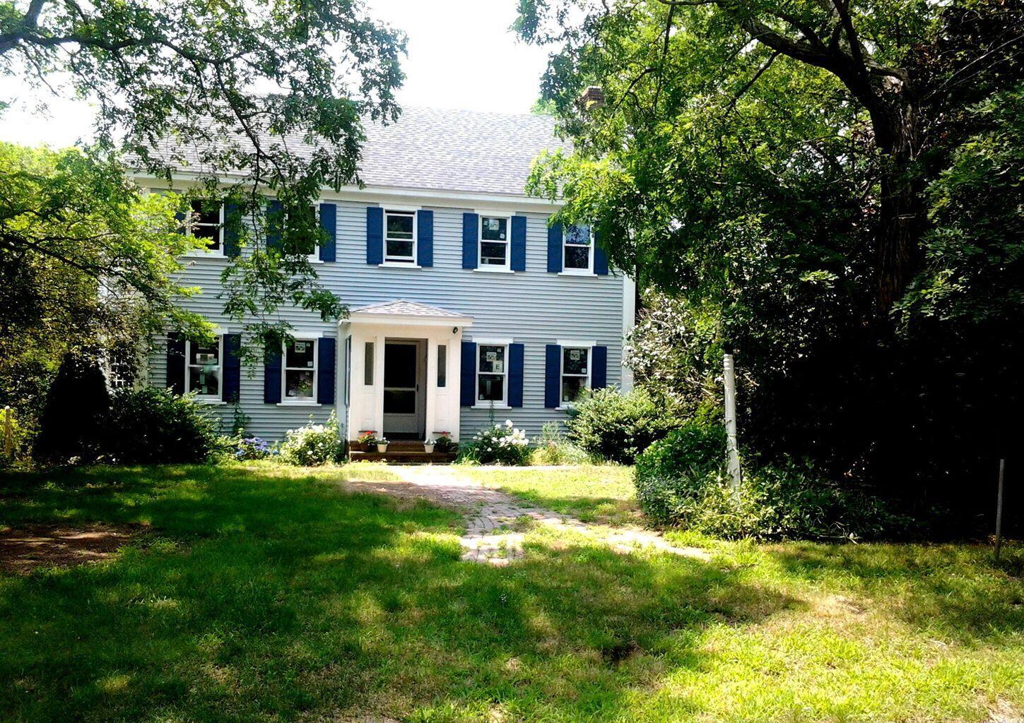 105 Townsend Avenue Eastham, MA 02642 - Photo 7 of 16 a front view of a house with a yard