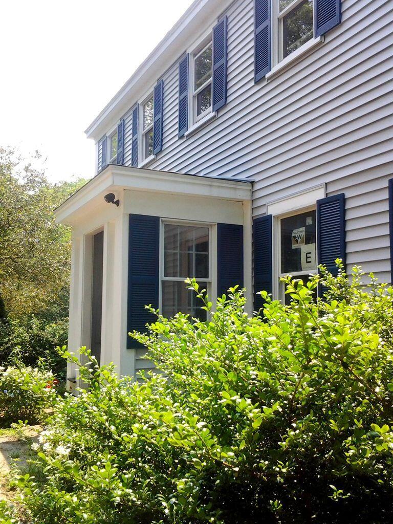 105 Townsend Avenue Eastham, MA 02642 - Photo 8 of 16 front view of a house with a yard
