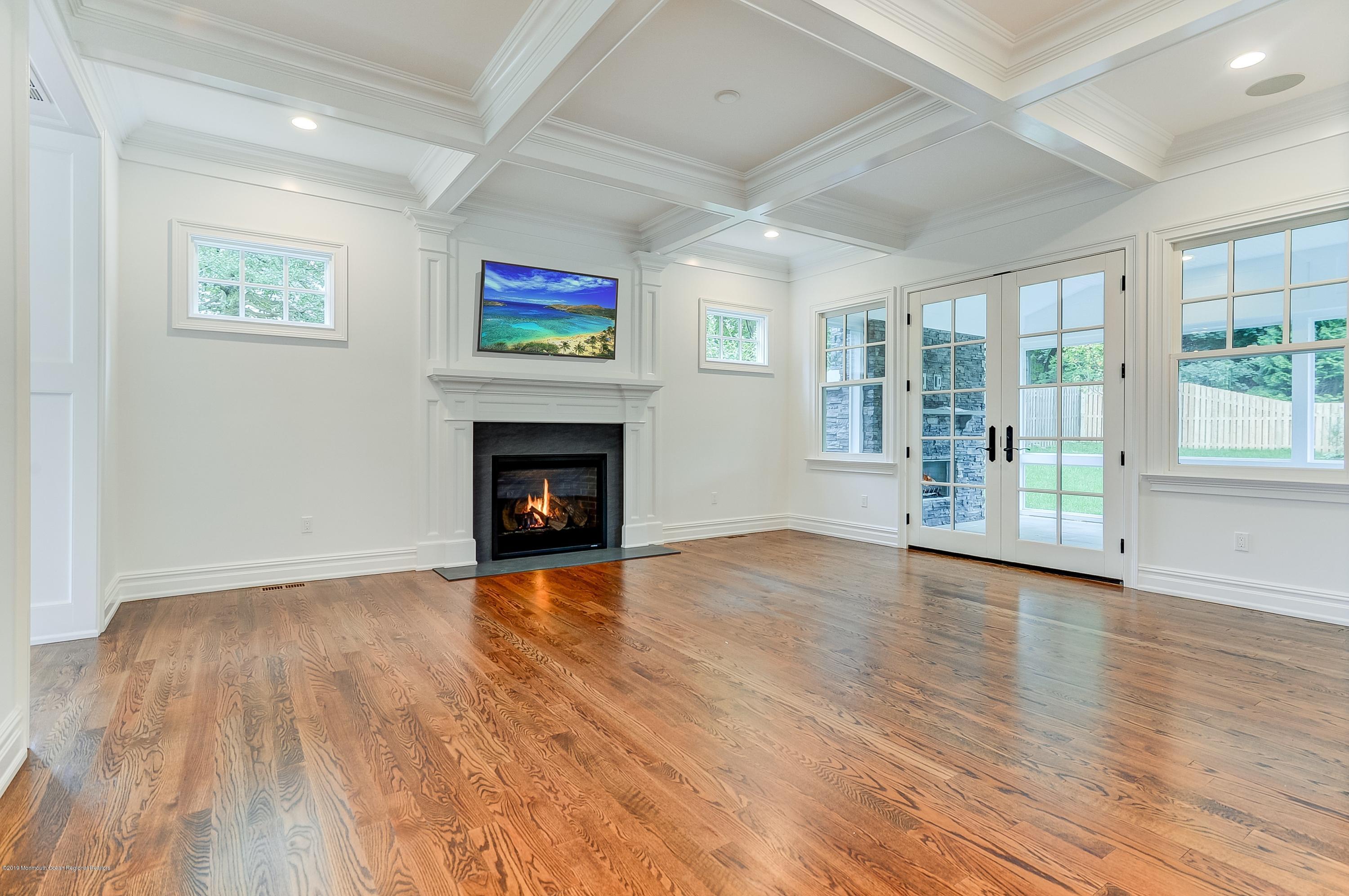 26 Hillcrest Road Fair Haven, NJ 07704 - Photo 15 of 46 Family room leads to screened-in porch!
