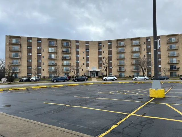 a view of a swimming pool with lounge chair