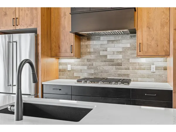 a bathroom with a sink a vanity and window