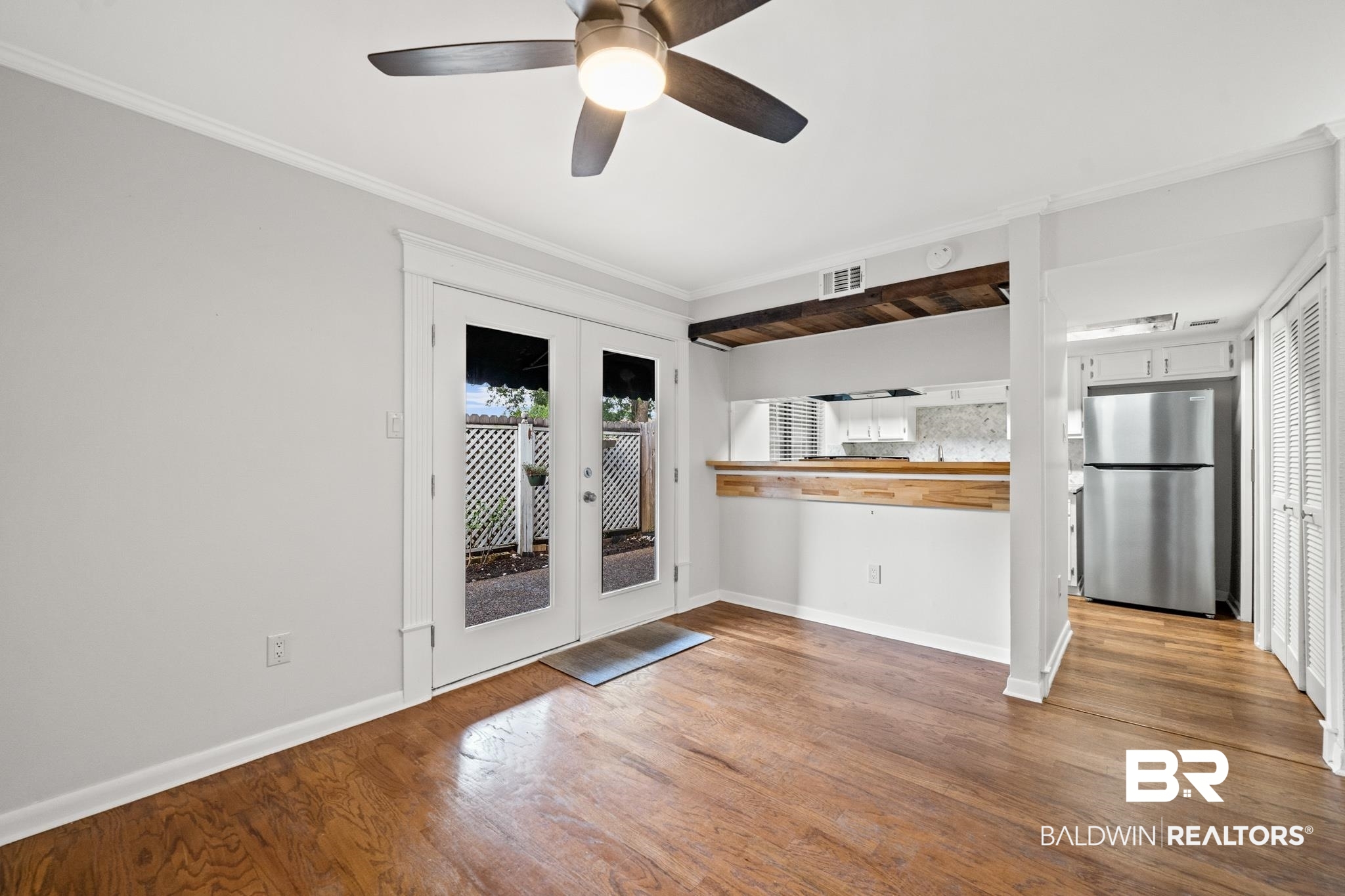 2901 Grant Street, Unit 802 Mobile, AL 36606 - Photo 12 of 37 Interior space with french doors, hardwood / wood-style floors, and ceiling fan