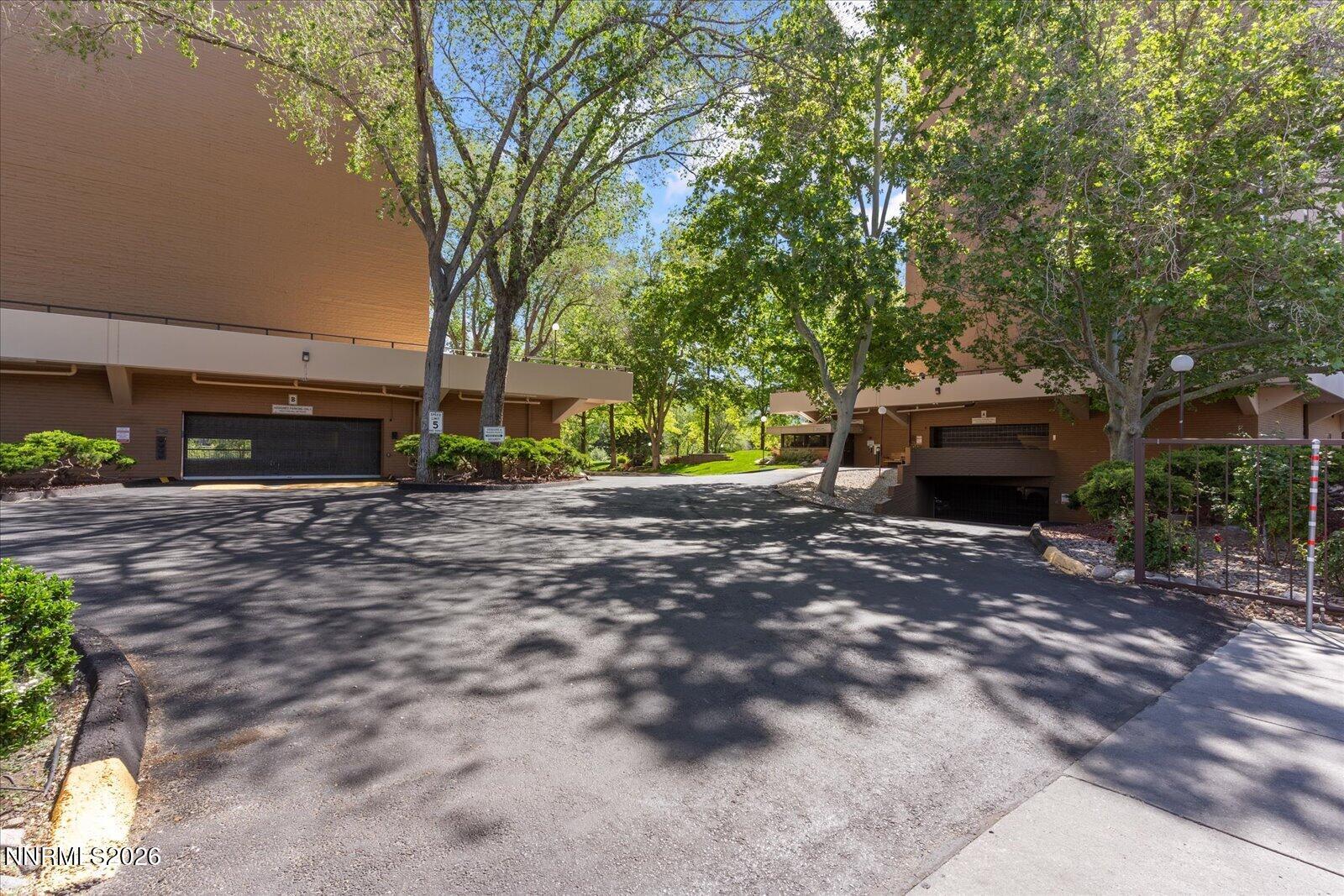 1200 Riverside Drive, Unit 1229 Reno, NV 89503 - Photo 4 of 51 a backyard of a house with lots of green space