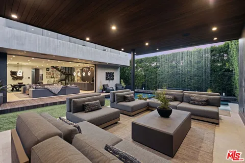 a living room with furniture and a table