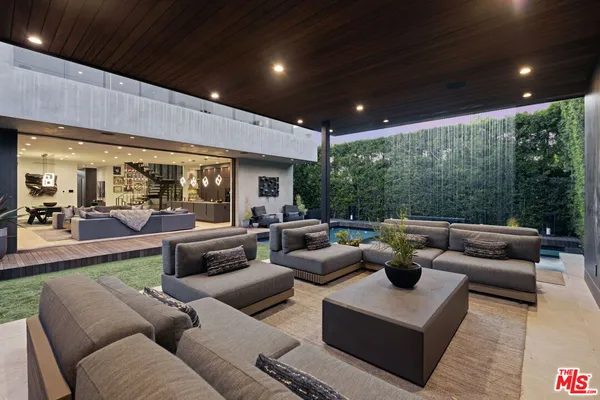 a living room with furniture and a table